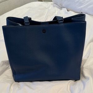 Dagne Dover Allyn 
Medium Pebble Blue Tote
Laptop sleeve
Never used